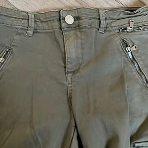 Green jeans with zippers. Never worn